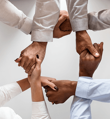 Team hands joining together